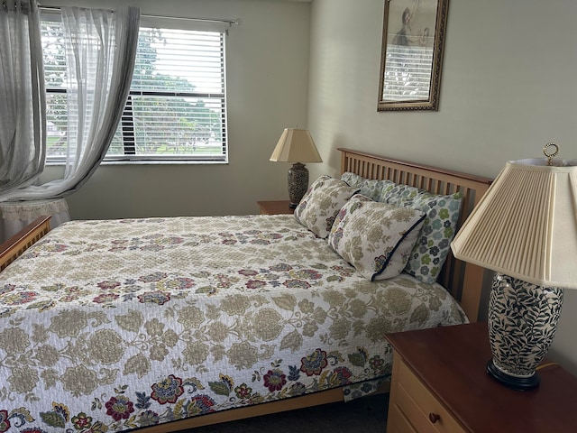 bedroom with multiple windows