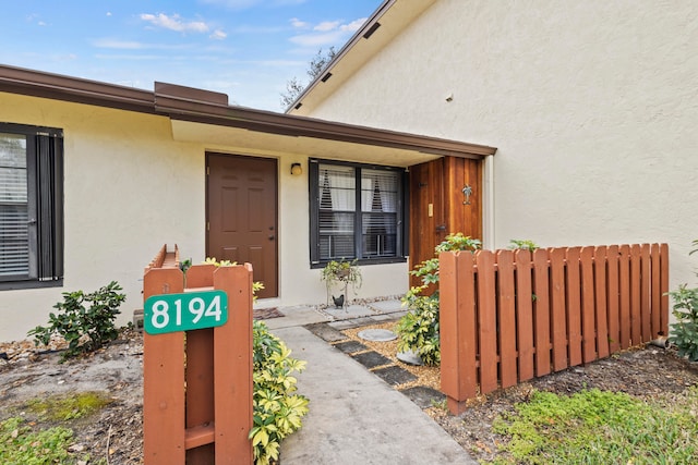 property entrance featuring radiator heating unit