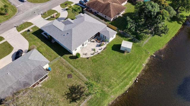 drone / aerial view with a water view