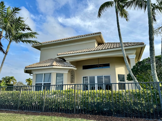 view of property exterior with ceiling fan