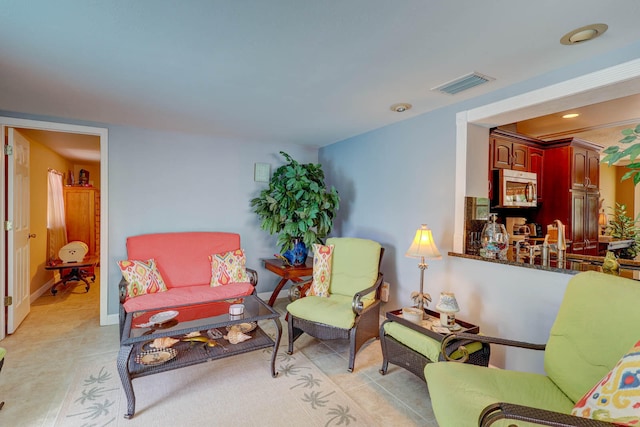 living room featuring light tile patterned floors