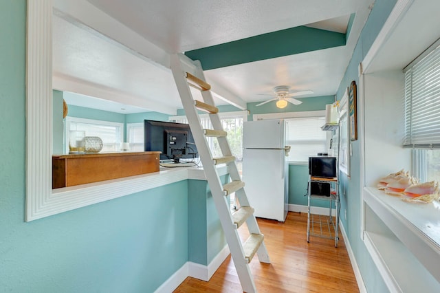 hall featuring light wood-type flooring