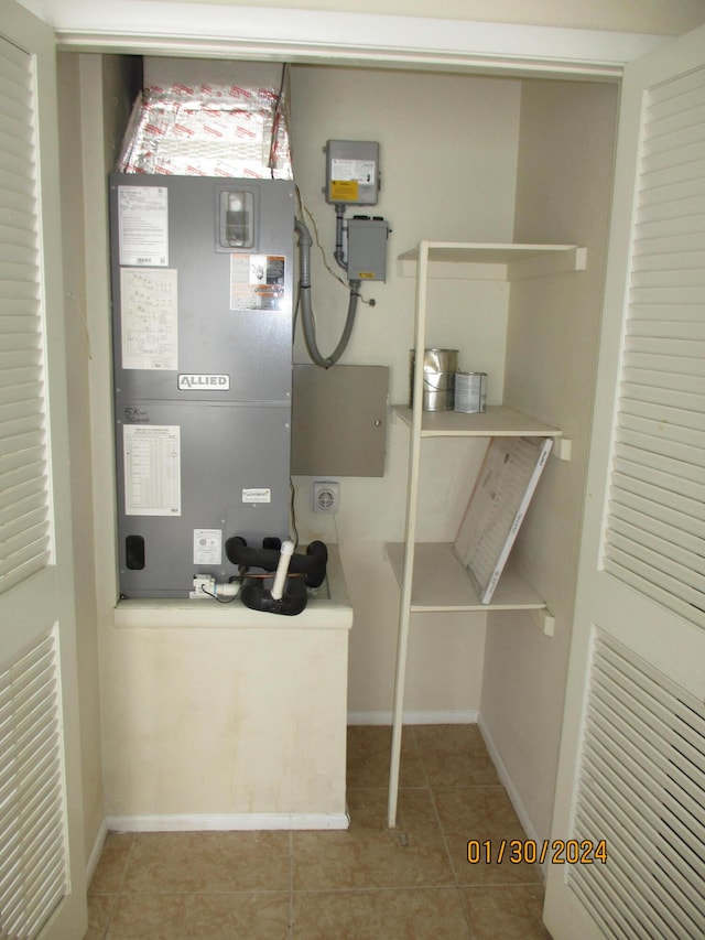 utility room featuring heating utilities