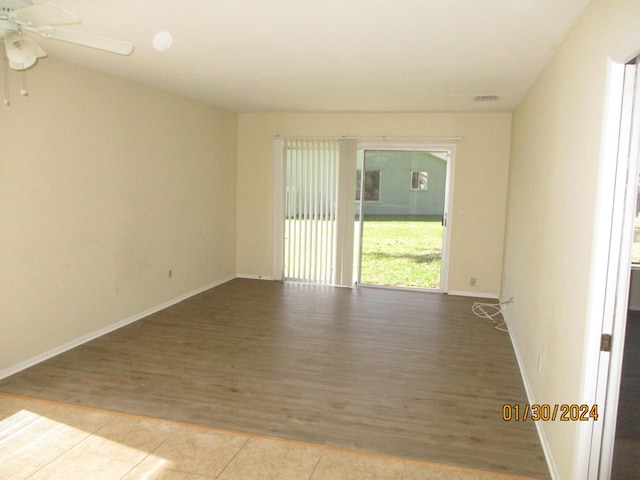 unfurnished room with light hardwood / wood-style floors and ceiling fan