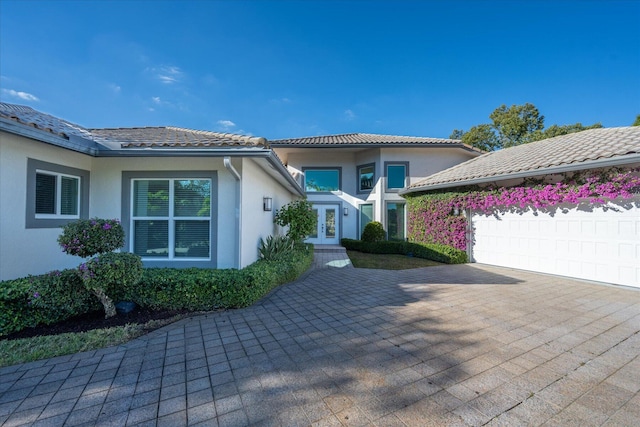 view of front of home featuring a garage