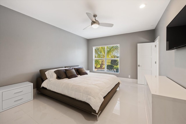 tiled bedroom with ceiling fan