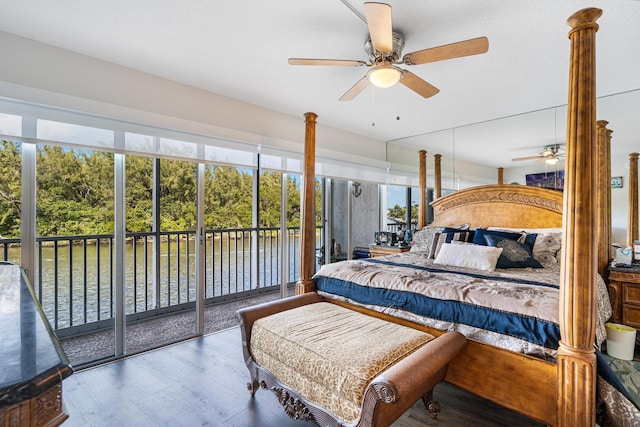 bedroom with access to exterior, ceiling fan, and hardwood / wood-style flooring