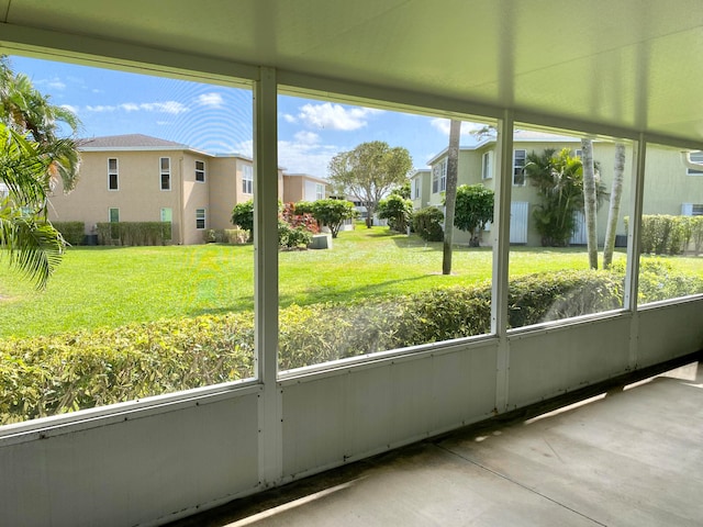 unfurnished sunroom featuring a healthy amount of sunlight