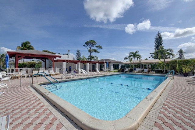 view of pool featuring a gazebo and a patio