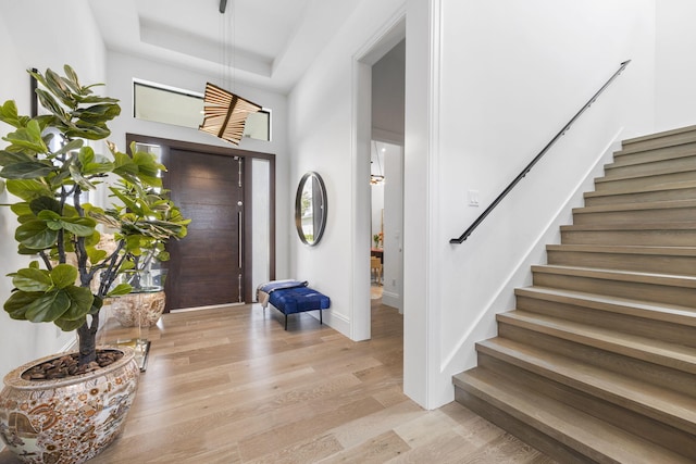 foyer entrance with light wood-type flooring