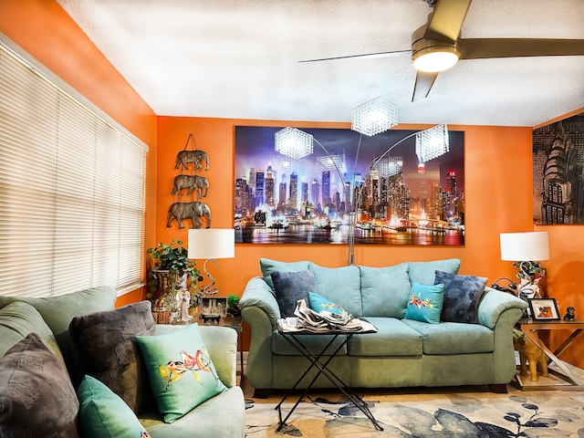 living room featuring ceiling fan