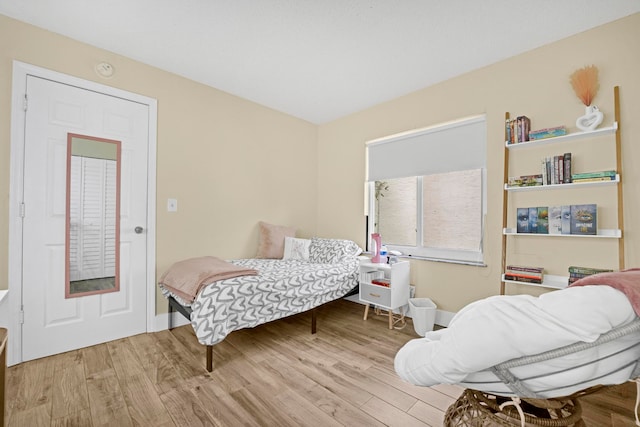 bedroom featuring light wood-type flooring