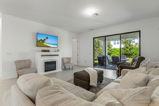 living room featuring light tile flooring