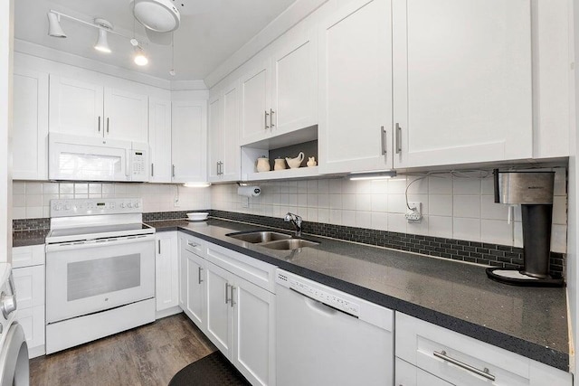 kitchen featuring white cabinetry, white appliances, sink, and tasteful backsplash