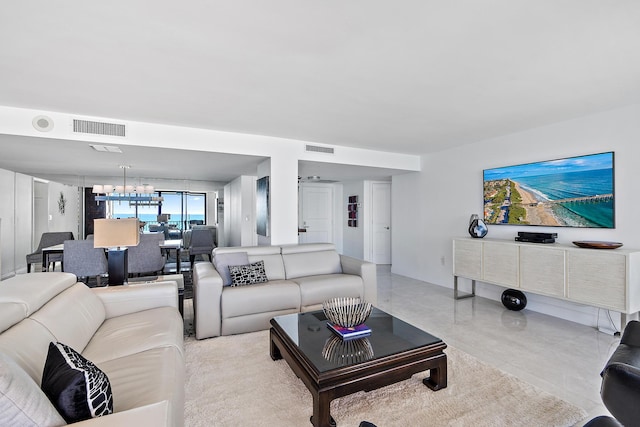 living room with a chandelier