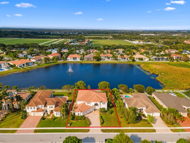 drone / aerial view featuring a water view