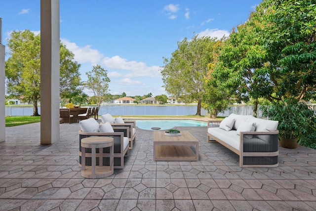 view of patio / terrace featuring a fenced in pool and an outdoor hangout area