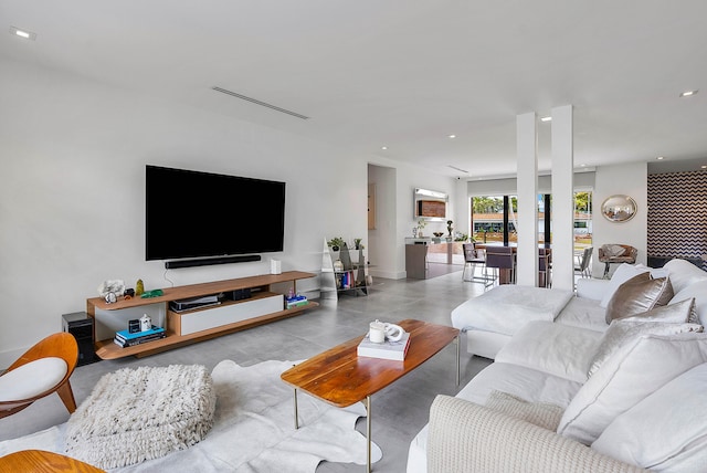 living room featuring light tile floors