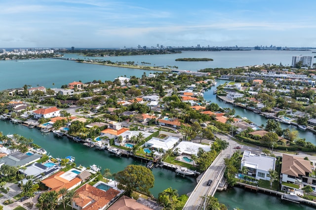 bird's eye view with a water view