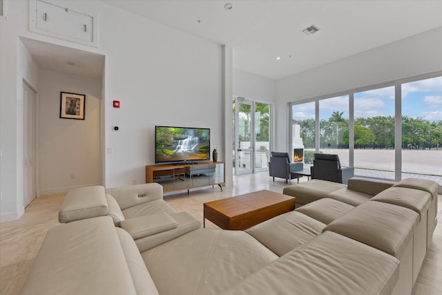 living room featuring light tile flooring