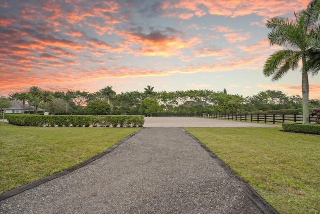 view of home's community featuring a yard