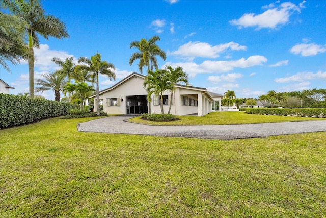 view of home's exterior featuring a lawn