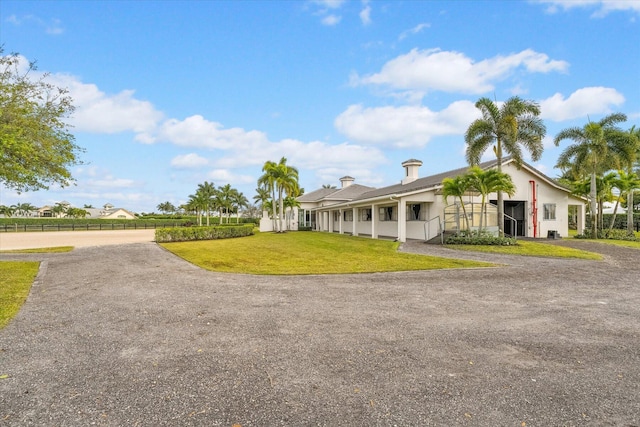 single story home with a front yard