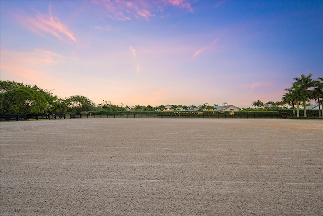 view of yard at dusk