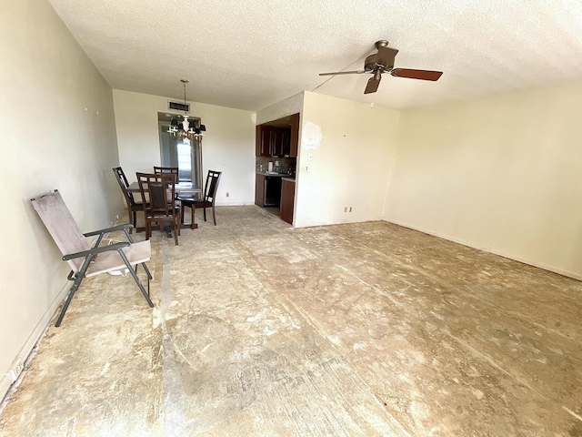 dining room with a textured ceiling and ceiling fan with notable chandelier