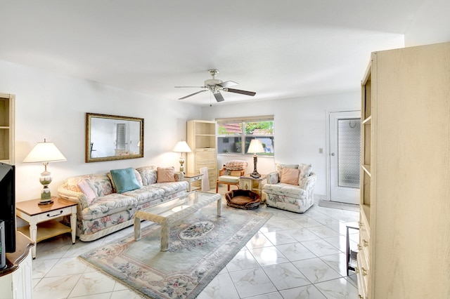 living room with ceiling fan and light tile floors