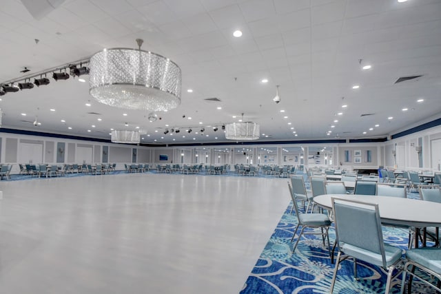 dining space with a notable chandelier