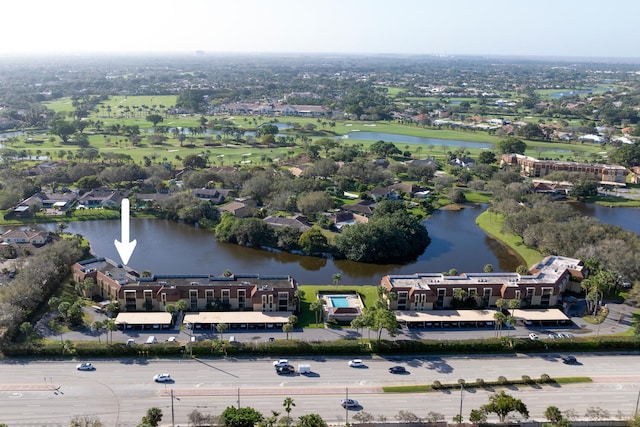 birds eye view of property featuring a water view