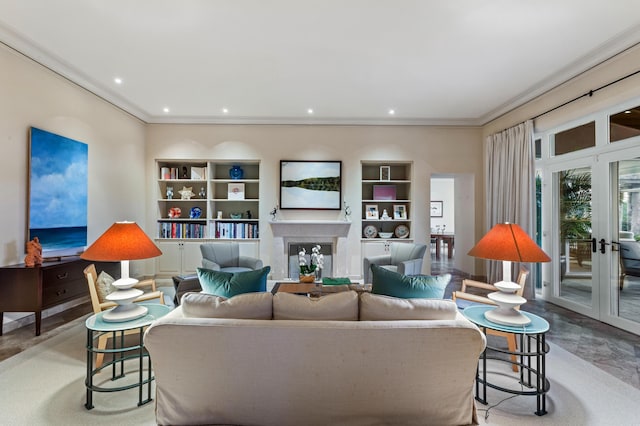 living room with built in features, crown molding, french doors, and light tile flooring