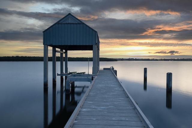 dock area featuring a water view