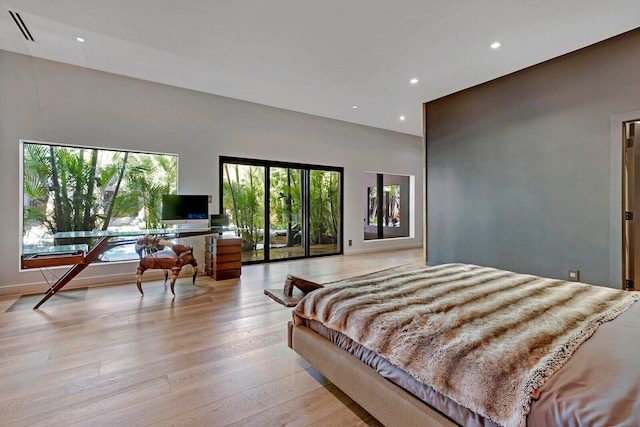 bedroom with light hardwood / wood-style floors