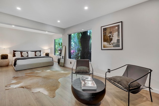 bedroom with light hardwood / wood-style flooring