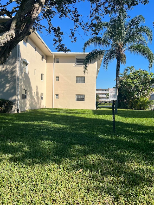 exterior space with a lawn