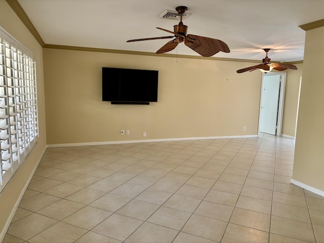 tiled empty room featuring ornamental molding