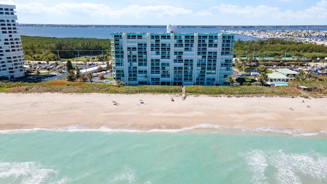 aerial view with a beach view and a water view