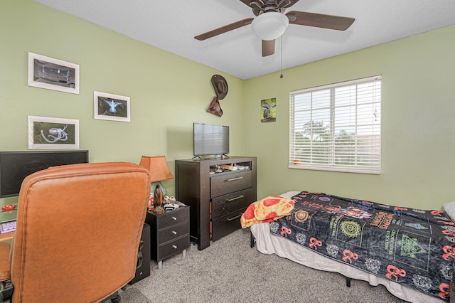 carpeted bedroom featuring ceiling fan