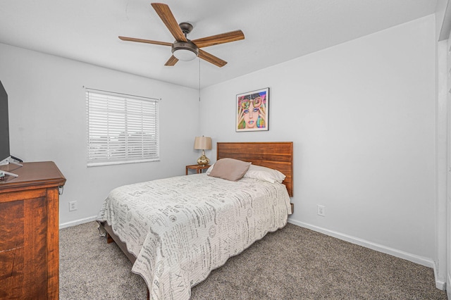 bedroom with dark carpet and ceiling fan