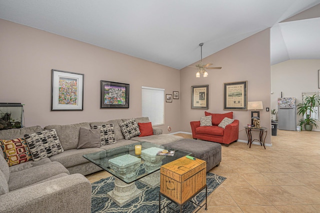 tiled living room with ceiling fan and lofted ceiling