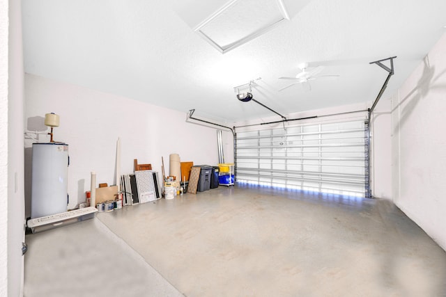 garage featuring a garage door opener, water heater, and ceiling fan