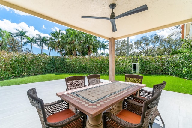 view of patio with ceiling fan