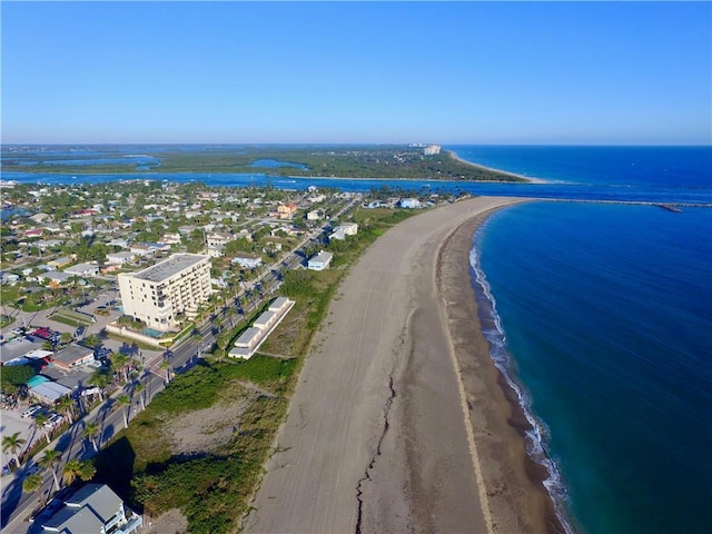 aerial view featuring a beach view and a water view