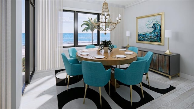 dining space featuring crown molding, a water view, and a notable chandelier