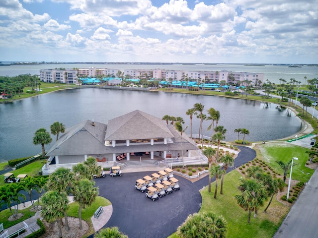 birds eye view of property with a water view