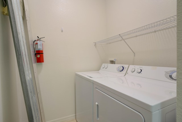 laundry area featuring separate washer and dryer