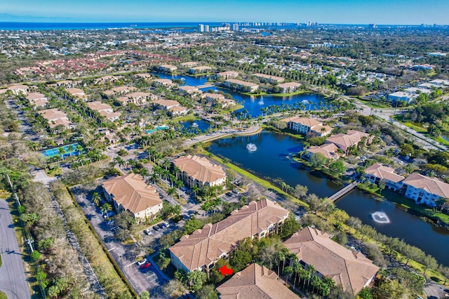 drone / aerial view featuring a water view