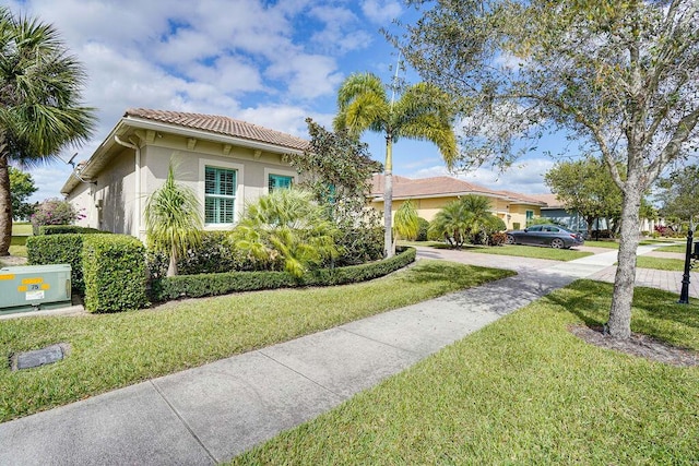 view of front of house with a front lawn